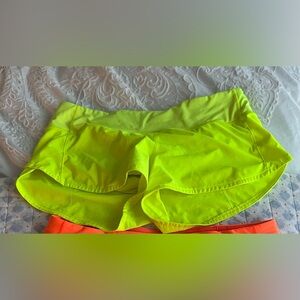 Lululemon 2.5 in yellow shorts